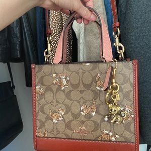 NWTS Dempsey Tote 22 In Signature Canvas With Dancing Kitten Print